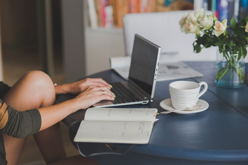 Laptop, workstaion, office — Understanding the Role of a Bail Bondsman in Adams County